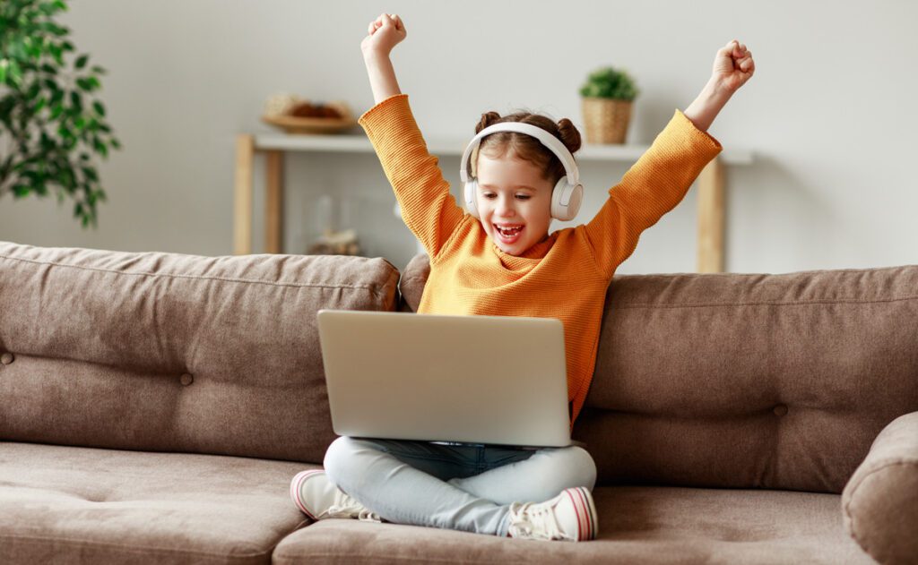 A primary school pupil enjoying elearning