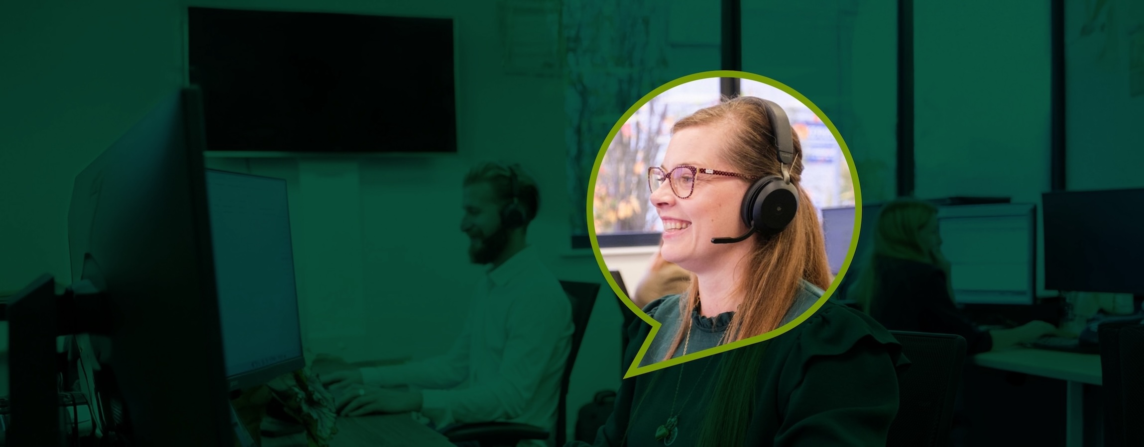 A Croft Managed Service Provider expert talking on a telephone while working at a computer.