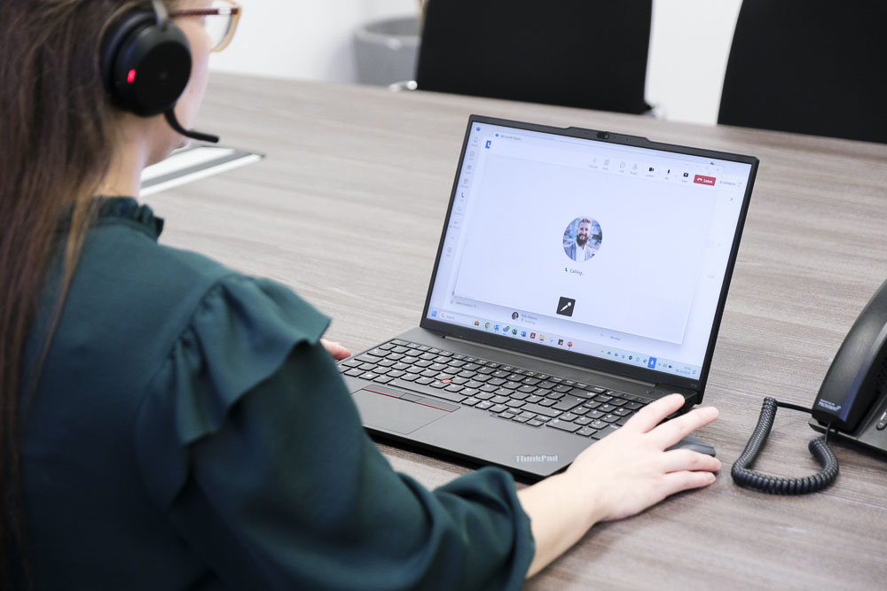 FTTP expert working at a laptop