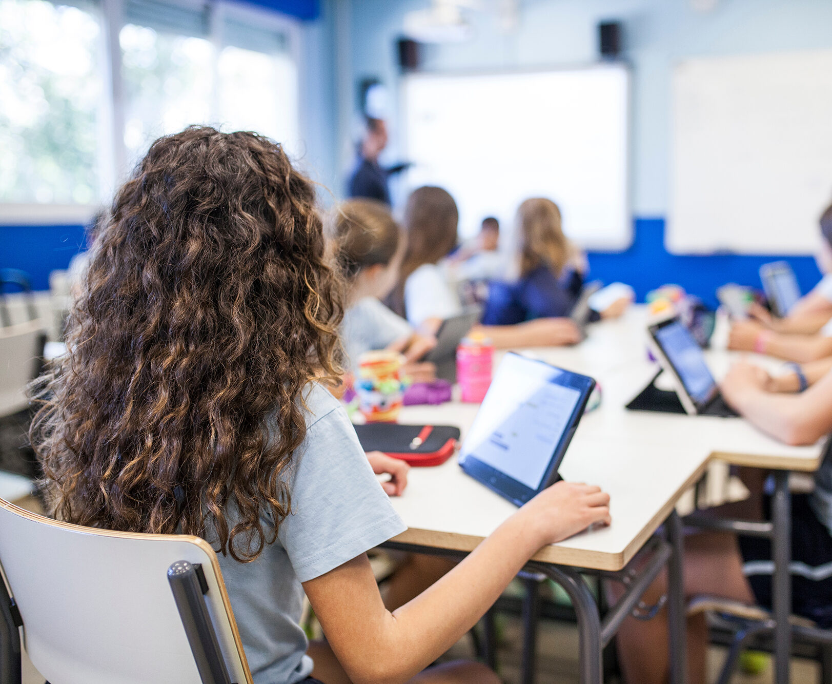 Phone systems for schools Martyns Law school children in classroom protected by Martyn's Law