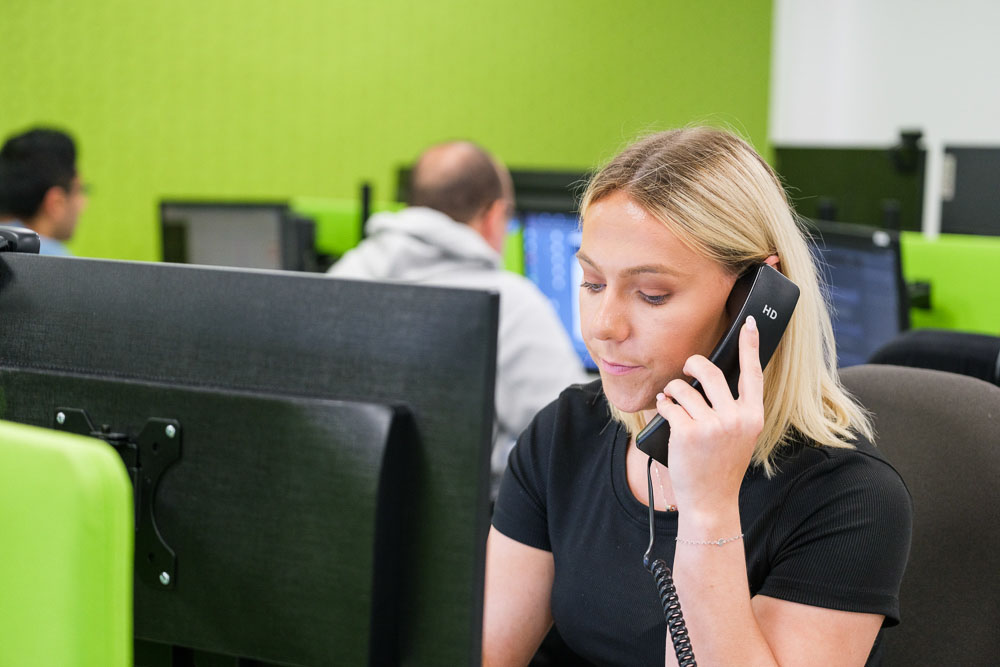 Martyn's Law expert talking on a desktop phone