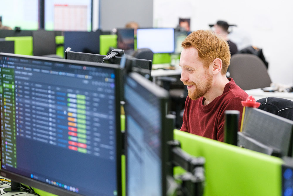 Bitdefender partner expert working at a desktop computer