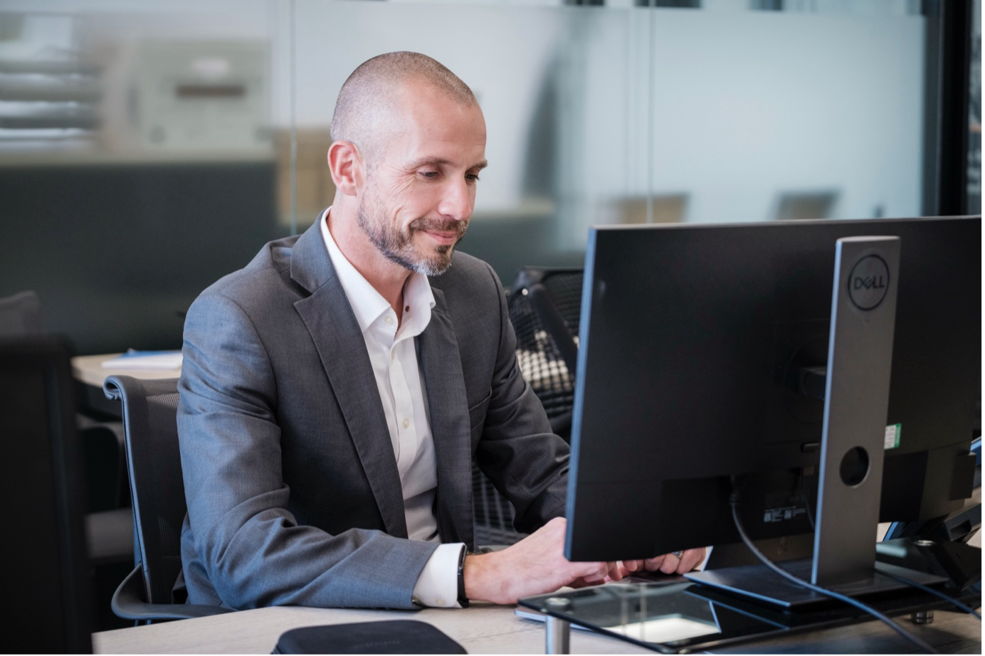 WatchGuard Partner expert working at a desktop